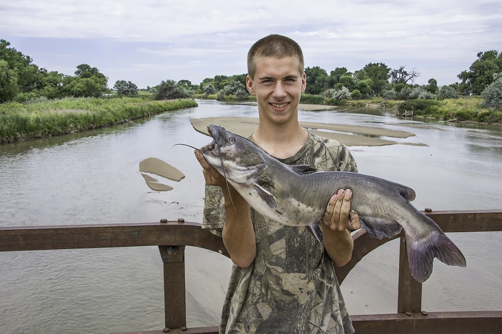 Boy With Catfish, Caught With A Bobber, Platte River, Nebraska 